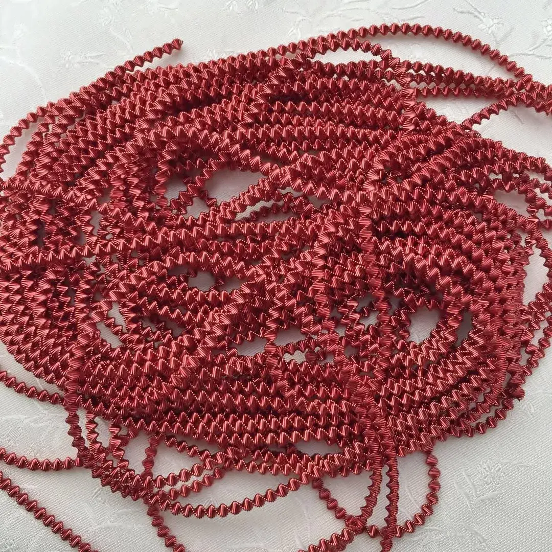 Boulliondraht Zackenboullion dick in rot – Bild 1 – Chiemgauer Heimatwerk traditioneller Trachten-Onlineshop Boulliondraht Zackenboullion dick in rot - Bild 1 - Chiemgauer Heimatwerk traditioneller Trachten-Onlineshop