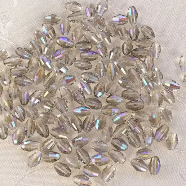 Swarovski Olive geschliffen grau AB 6 mm – Bild 1 – Chiemgauer Heimatwerk Trachten-Onlineshop Swarovski Olive geschliffen grau AB 6 mm - Bild 1 - Chiemgauer Heimatwerk Trachten-Onlineshop