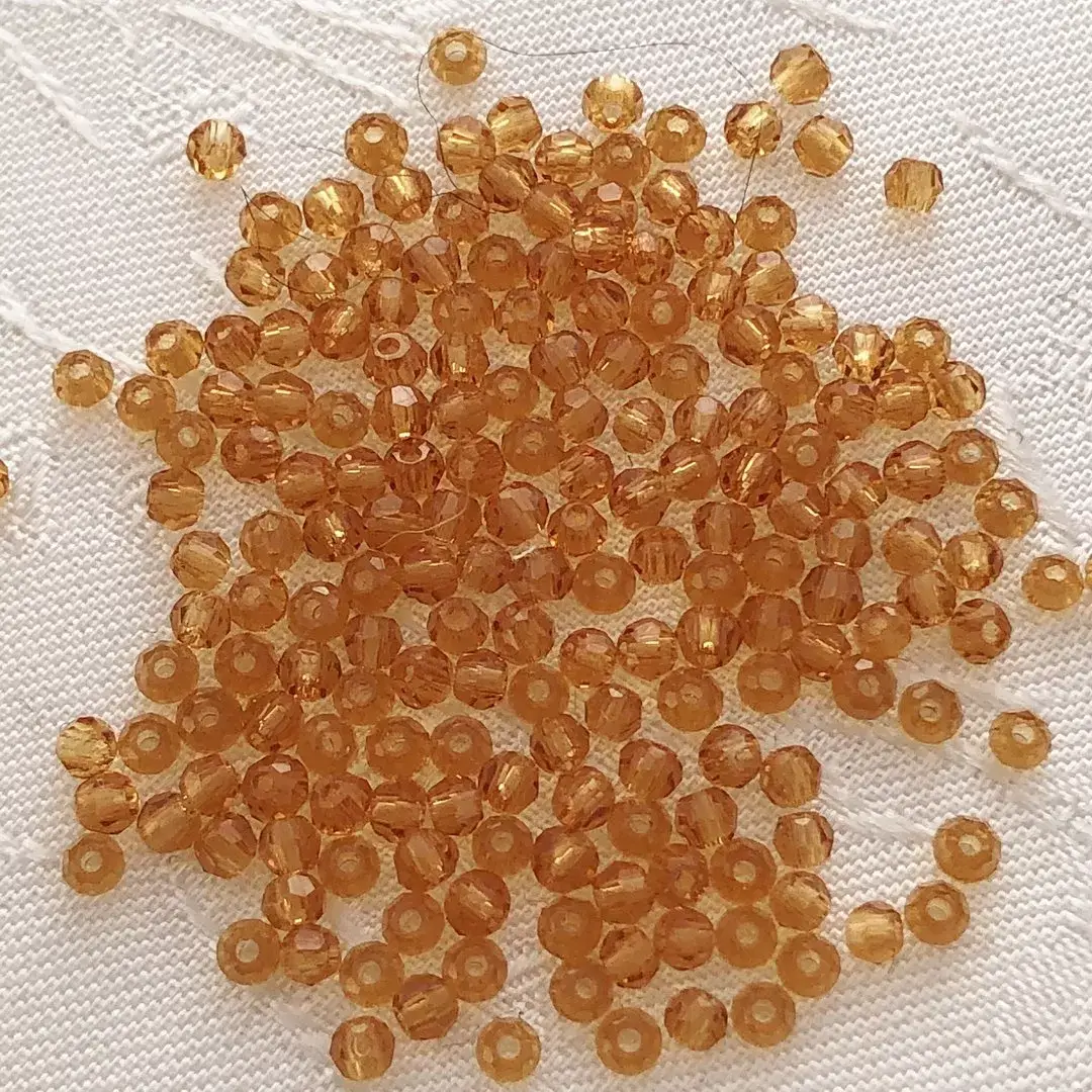 Swarovski Perle geschliffen topas 1,5 mm – Bild 1 – Chiemgauer Heimatwerk Trachten-Onlineshop Swarovski Perle geschliffen topas 1,5 mm - Bild 1 - Chiemgauer Heimatwerk Trachten-Onlineshop