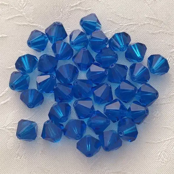 Swarovski Rhombe geschliffen enzianblau 8 mm – Bild 1 – Chiemgauer Heimatwerk Trachten-Onlineshop Swarovski Rhombe geschliffen enzianblau 8 mm - Bild 1 - Chiemgauer Heimatwerk Trachten-Onlineshop