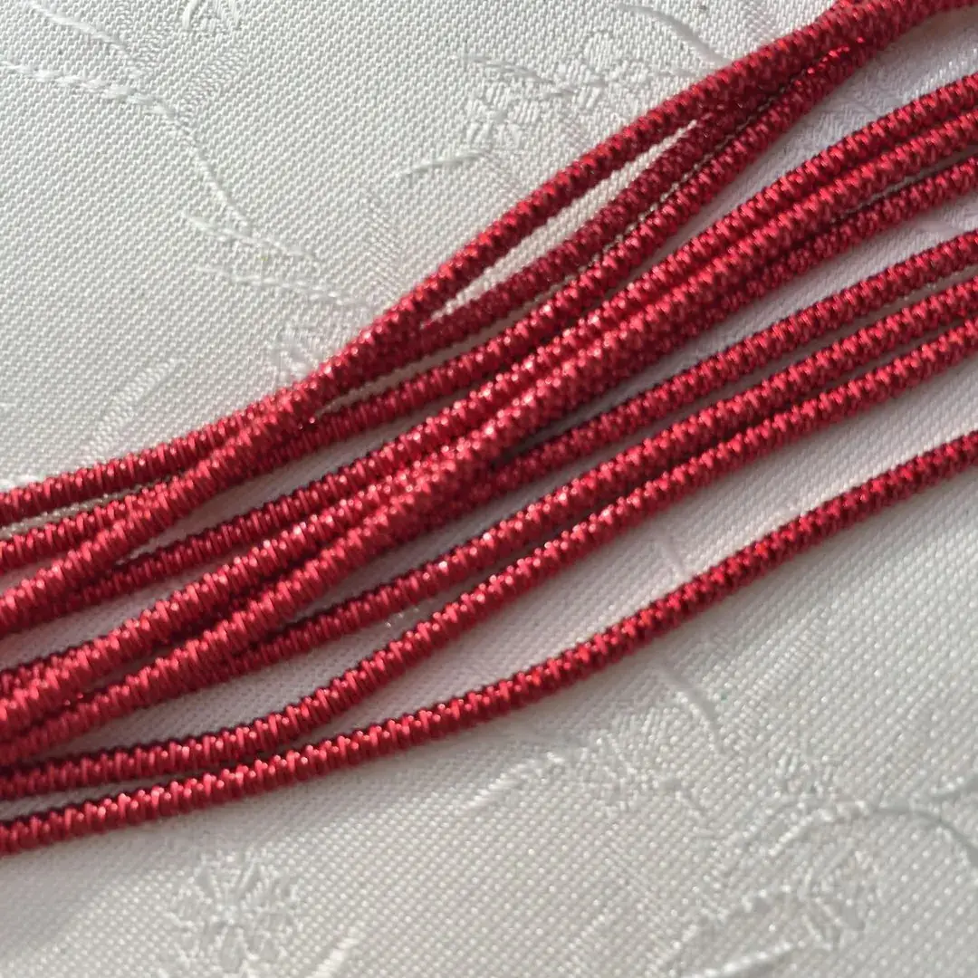 Boulliondraht Zackenkrausboullion in rot – Bild 14 – Chiemgauer Heimatwerk traditioneller Trachten-Onlineshop Boulliondraht Zackenkrausboullion in rot - Bild 14 - Chiemgauer Heimatwerk traditioneller Trachten-Onlineshop