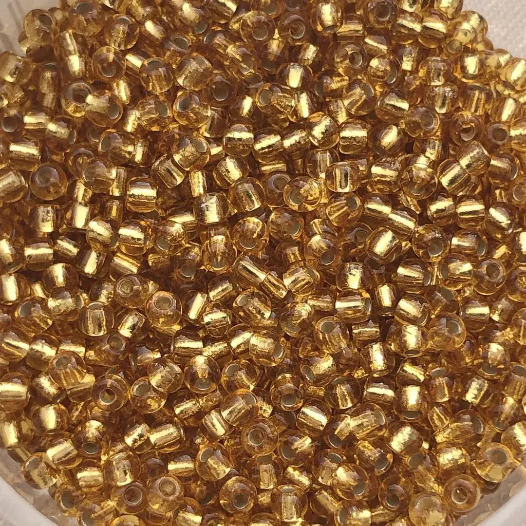 Rocailles Glasperlen gold No. 35 – Bild 7 – Chiemgauer Heimatwerk Trachten-Onlineshop Rocailles Glasperlen gold No. 35 - Bild 7 - Chiemgauer Heimatwerk Trachten-Onlineshop