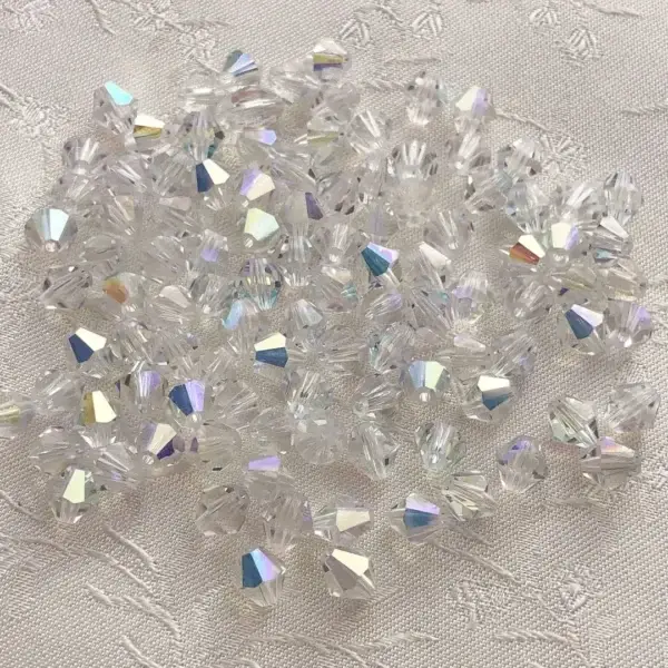 Swarovski Rhombe geschliffen kristall AB 5 mm – Bild 1 – Chiemgauer Heimatwerk Trachten-Onlineshop Swarovski Rhombe geschliffen kristall AB 5 mm - Bild 1 - Chiemgauer Heimatwerk Trachten-Onlineshop