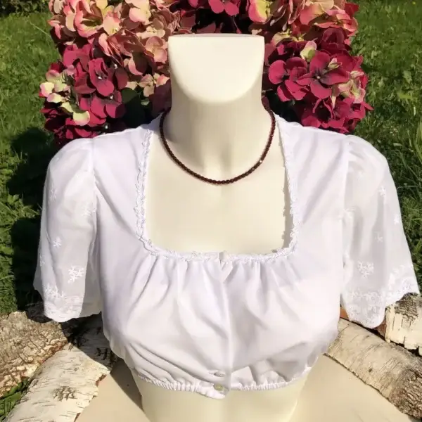 Trachtencollier aus Granatschliffperlen – Bild 1 – Chiemgauer Heimatwerk Trachten-Onlineshop Trachtencollier aus Granatschliffperlen - Bild 1 - Chiemgauer Heimatwerk Trachten-Onlineshop